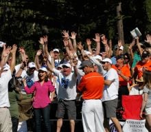 Volunteers cheering at tournament